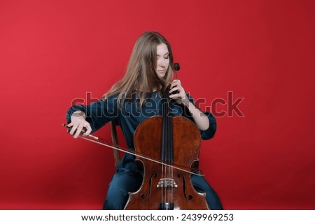 cinematic, young woman playing the cello, close-up and medium, cello bow and strings, beautiful filmic, artistic shot