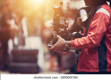 cinematography assistant shoot video with any camera handheld case rig and monitor - Shutterstock ID 1890045784