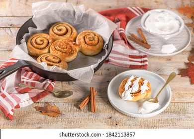 Cinnamon Buns With Chocolate Chips Baked In A Cast Iron Pan Overhead Shot