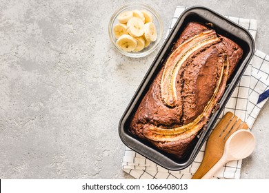 Cinnamon crunch banana bread on light concrete background. Selective focus, space for text.