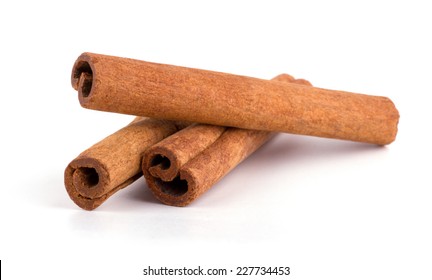 Cinnamon isolated on white background cutout - Shutterstock ID 227734453