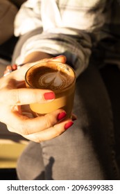 Cinnamon Macchiato In A Glass Beaker In The Cafe
