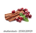 Cinnamon pods and cranberries on white backgrounds. Fragrant spice and berries. Ingredient mulled wine