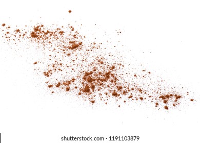 Cinnamon powder or dust on the white
