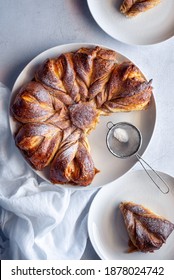 Cinnamon pull-apart bread shaped like a snowflake being served for Christmas. 