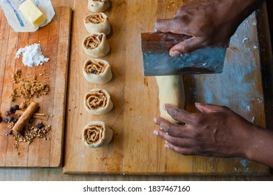 Cinnamon Rolls, Iced With Cream Cheese Frosting. Classic American Breakfast Pastry Favorite. Action Shots On How To Make Cinnamon Rolls.