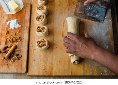 Cinnamon Rolls, Iced With Cream Cheese Frosting. Classic American Breakfast Pastry Favorite. Action Shots On How To Make Cinnamon Rolls.