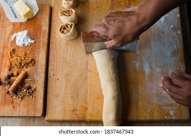 Cinnamon Rolls, Iced With Cream Cheese Frosting. Classic American Breakfast Pastry Favorite. Action Shots On How To Make Cinnamon Rolls.