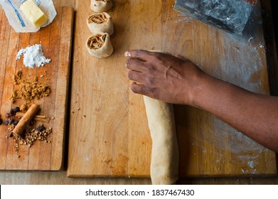 Cinnamon Rolls, Iced With Cream Cheese Frosting. Classic American Breakfast Pastry Favorite. Action Shots On How To Make Cinnamon Rolls.