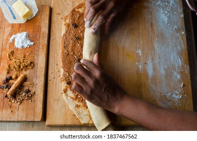 Cinnamon Rolls, Iced With Cream Cheese Frosting. Classic American Breakfast Pastry Favorite. Action Shots On How To Make Cinnamon Rolls.