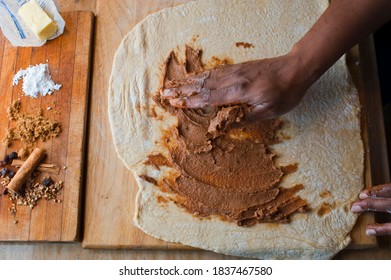 Cinnamon Rolls, Iced With Cream Cheese Frosting. Classic American Breakfast Pastry Favorite. Action Shots On How To Make Cinnamon Rolls.