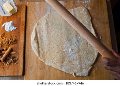 Cinnamon Rolls, Iced With Cream Cheese Frosting. Classic American Breakfast Pastry Favorite. Action Shots On How To Make Cinnamon Rolls.