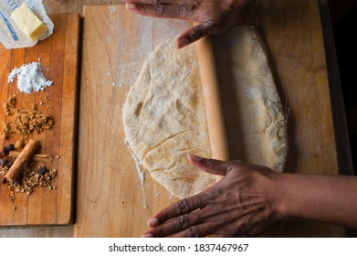 Cinnamon Rolls, Iced With Cream Cheese Frosting. Classic American Breakfast Pastry Favorite. Action Shots On How To Make Cinnamon Rolls.