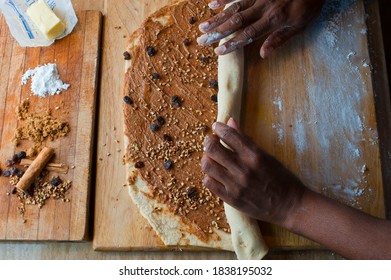 Cinnamon Rolls, Iced With Cream Cheese Frosting. Classic American Breakfast Pastry Favorite. Action Shots On How To Make Cinnamon Rolls.