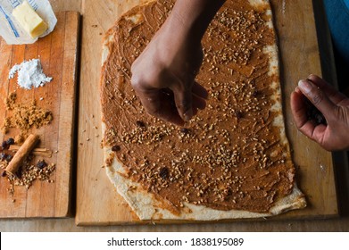 Cinnamon Rolls, Iced With Cream Cheese Frosting. Classic American Breakfast Pastry Favorite. Action Shots On How To Make Cinnamon Rolls.