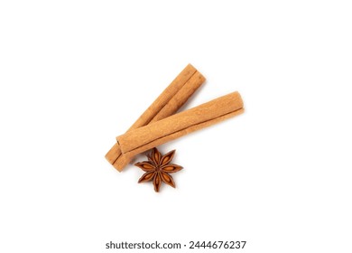 Cinnamon sticks and anise isolated on white background. Cinnamon roll and star anise. Spicy spice for baking, desserts and drinks. Fragrant ground cinnamon. - Powered by Shutterstock