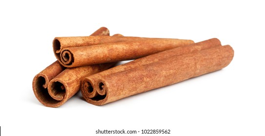 Cinnamon sticks isolated on white background - Shutterstock ID 1022859562