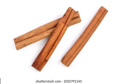 Cinnamon sticks isolated on white background. Top view