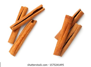 Cinnamon sticks isolated on white background. Top view. Flat lay