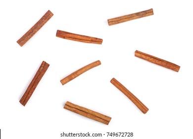 Cinnamon Sticks Isolated On White Background, Top View. Flat Lay Pattern