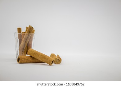 Cinnamon sticks on white background - Shutterstock ID 1103843762