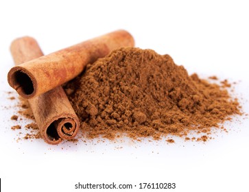 cinnamon sticks with powder isolated on white background - Shutterstock ID 176110283