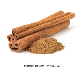 Cinnamon sticks with powder on white background - Shutterstock ID 247080793