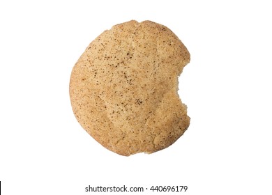 A Cinnamon Sugar Cookie Or Snicker Doodle From Overhead With A Bite Taken Out Of It.