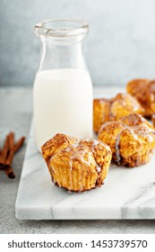 Cinnamon sugar monkey bread muffins with creamy glaze