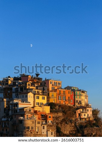 Cinque Terre on the cliffs bathed in the sunset
