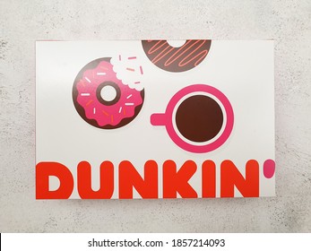 Ciputat, Indonesia, 19 November 2020: Isolated Dunkin' Donut Packaging On White Background. Copy Space.