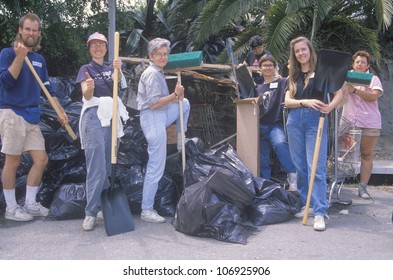 CIRCA 1990 - A Group Of Community People Clean Up The River On Earth Day
