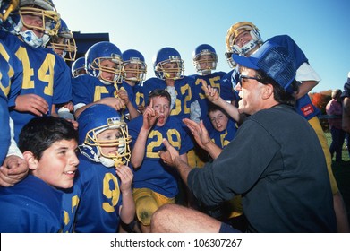 CIRCA 1994 - Coach Giving Youth Football Team A Pep Talk In Connecticut