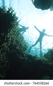 CIRCA 2010 MR Scuba Divers, Cave Opening At Surface, Milne Bay, Papua New Guinea