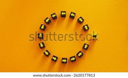 Circle of arrows with one going a different way. Thinking differently.