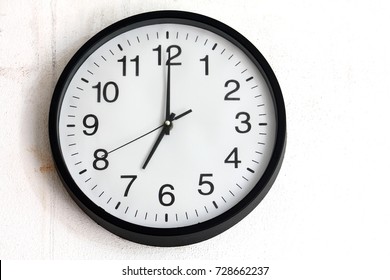 Circle Clock With White Cement At 7am.