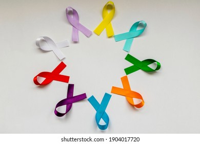 circle with colored ribbons of disease prevention campaigns. world cancer prevention day - Powered by Shutterstock