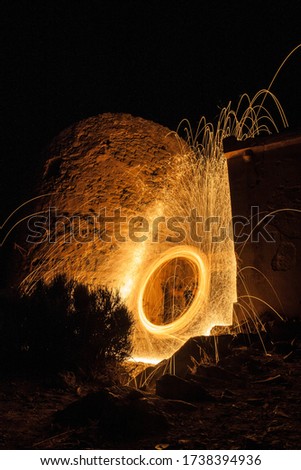Circle of fire in a building while it was dark