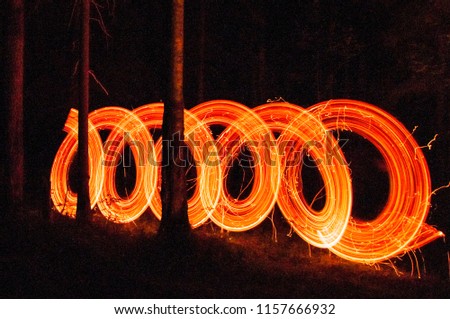 Circle Fireshow at forest in the dark