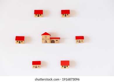 Circle Of Houses And A School In The Center, Symbol Image Of Community, School District, PTA And Online School