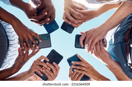 Circle people, phone hands and social media mobile apps, wifi and digital iot connection on blue sky. Below group social networking, smartphone and 5g internet website for cloud computing technology - Powered by Shutterstock