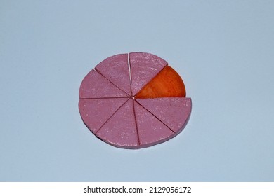 A Circle Of Pink Carrots Cut Into Eight Pieces One Piece Is An Orange Creative Vegetable Cake Concept