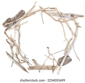 Circle of sea driftwood branches isolated on white background. Bleached dry aged drift wood.  - Shutterstock ID 2254055699