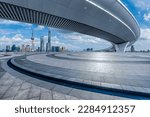 Circle square floor and bridge with city skyline in Shanghai, China.
