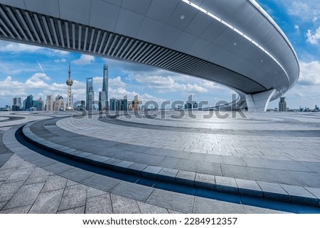 Circle square floor and bridge with city skyline in Shanghai, China.