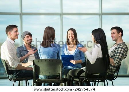 Circle of trust. Group of people are sitting in circle and supporting each other.