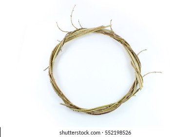 Circle of twisted vines and stems, isolated on white