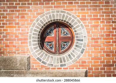 Circle Window On The Brick Wall