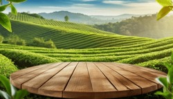 Circle Wooden Table Top With Blurred Tea Plantation Landscape Against Blue Sky And Blurred Green Leaf Frame Product Display Concept Natural Background 