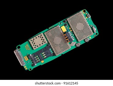 Circuit Board Of A Cell Phone Isolated On Black